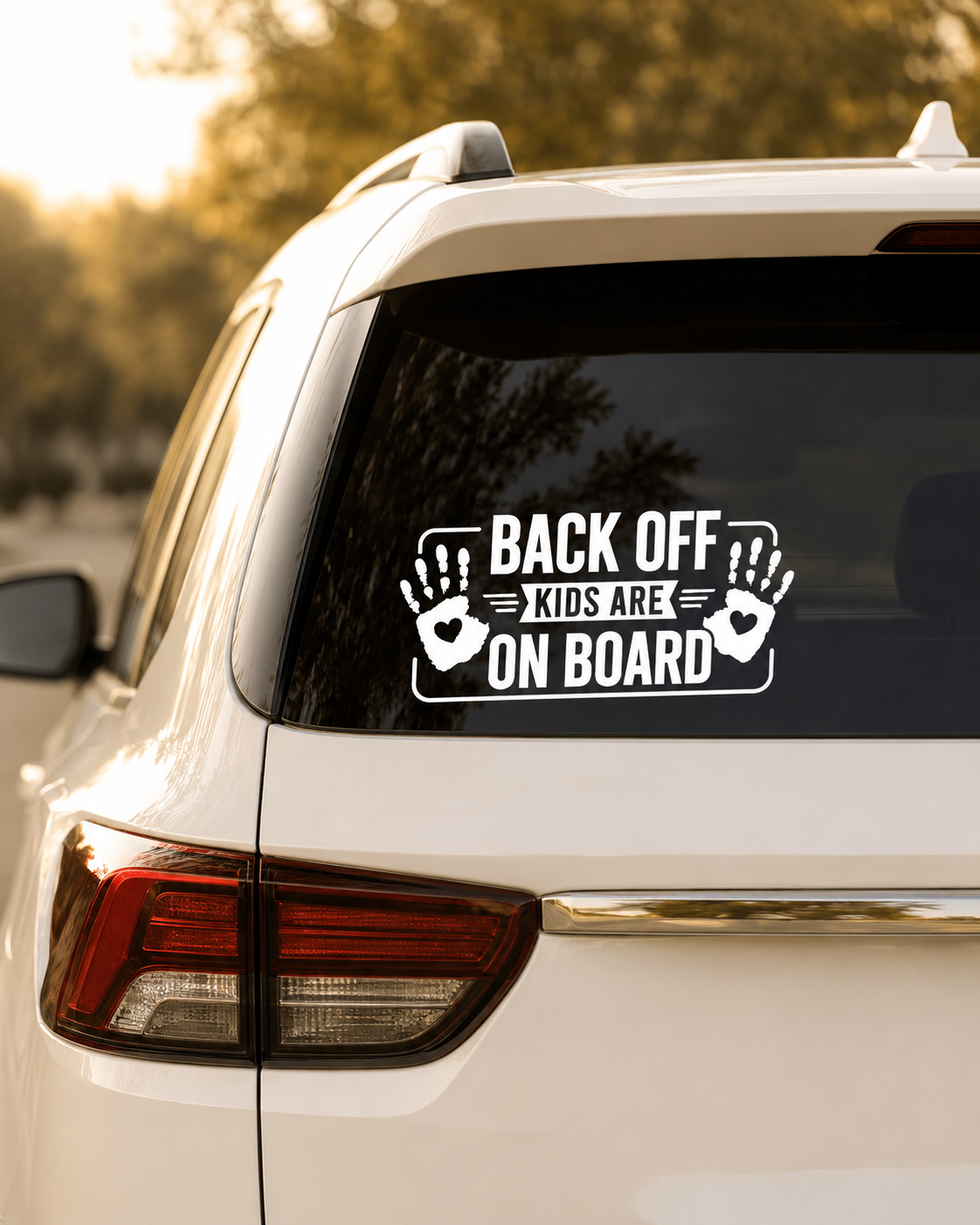 Car with 'Back off, kids are on board' decal on the back window