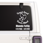 Memorial decal with 'Forever Loved, Forever Missed' text on a car window.