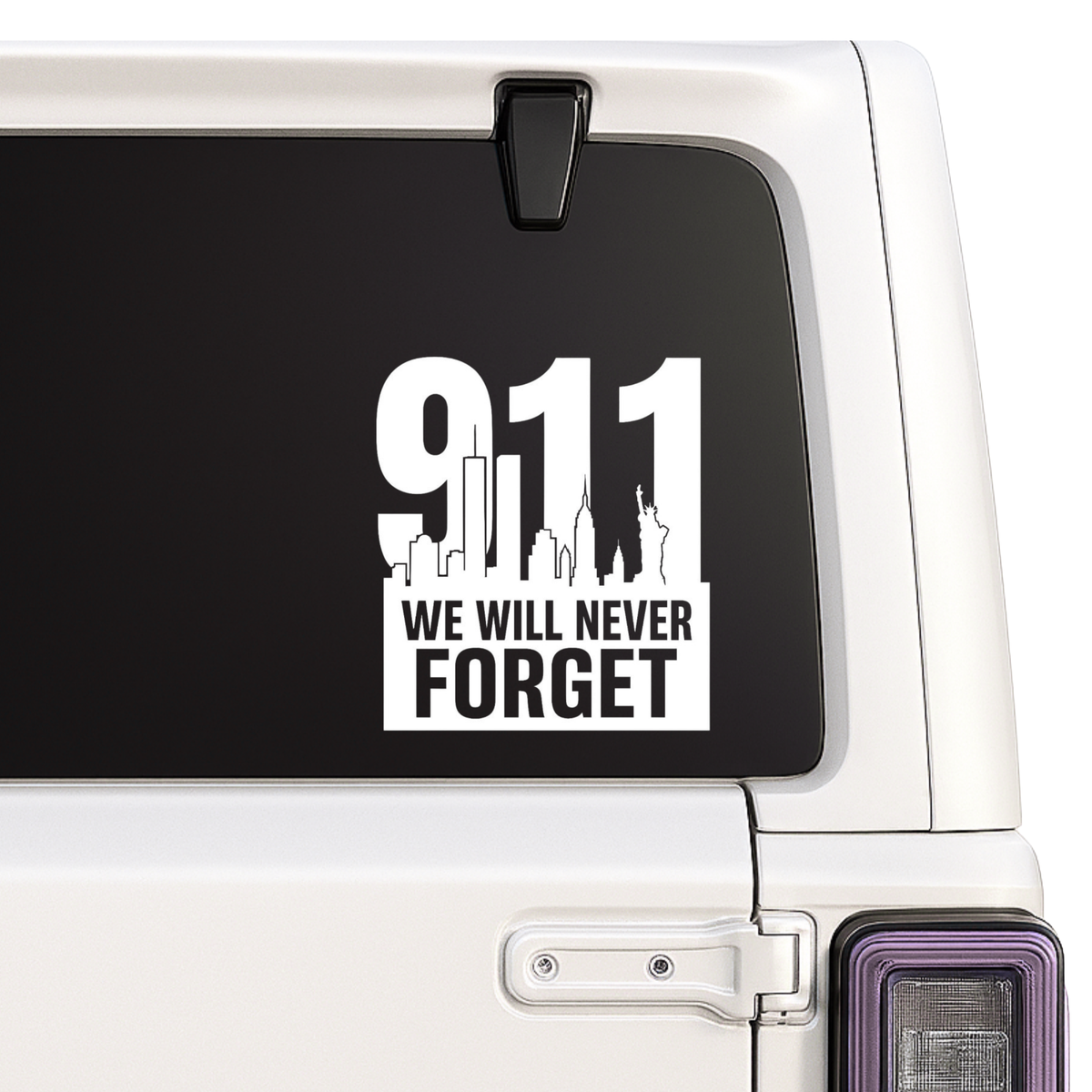 911 We Will Never Forget decal on a vehicle window