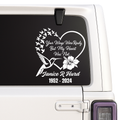 Memorial decal with text and birds on a car window