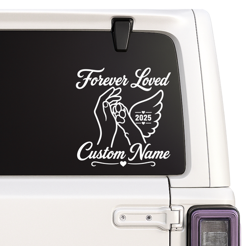Decal with 'Forever Loved' text and customizable name on a vehicle window.
