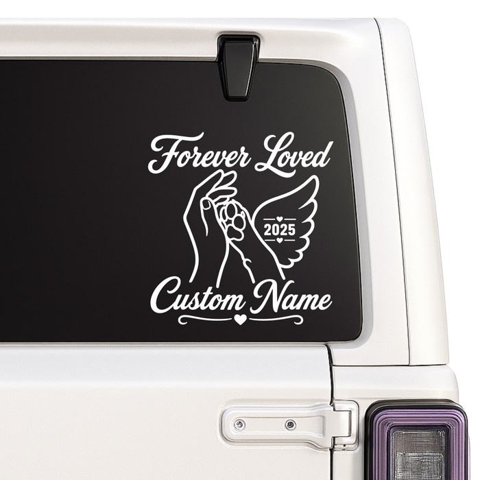 Decal with 'Forever Loved' text and customizable name on a vehicle window.