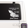 Memorial decal on a vehicle window with text and an illustration of a person on a lawn mower.