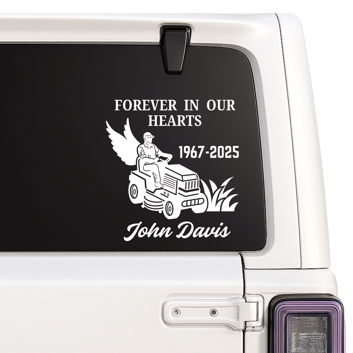 Memorial decal on a vehicle window with text and an illustration of a person on a lawn mower.