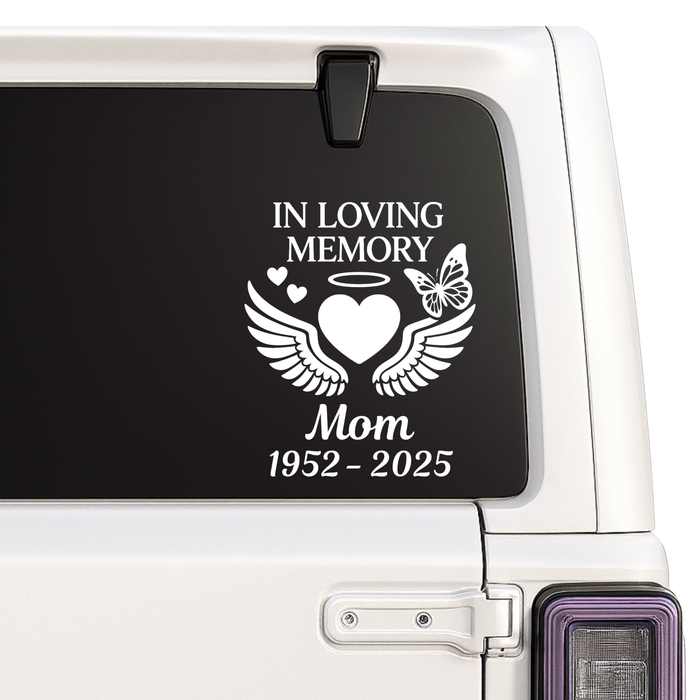 Memorial decal for a loved one on a vehicle window.
