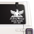 Memorial decal with angel and DJ equipment on a car window.