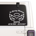Memorial decal with wings and text on a car window