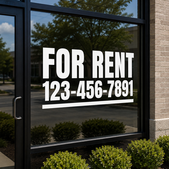 For Rent sign with contact number on a glass door of a building.