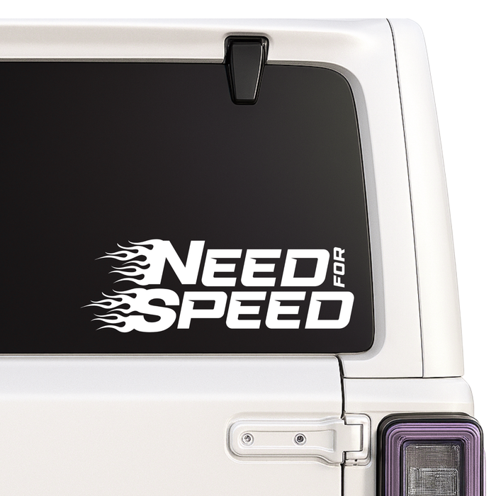 Car window with 'Need for Speed' decal on a white vehicle