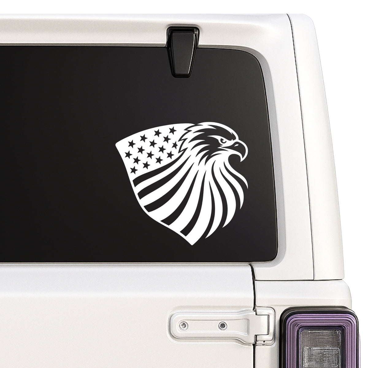 American eagle head — flowing stars-and-stripes design decal shown on a white Jeep window