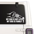 Dog Is Not a Pet, Dog Is Family — fist and paw design shown on a white Jeep window