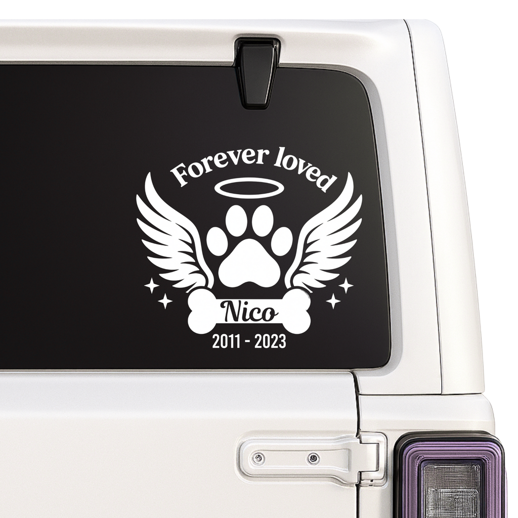 Forever Loved dog memorial decal with angel wings, paw print, halo and personalized name and years on a white vehicle