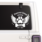 Forever Loved dog memorial decal with angel wings, paw print, halo and personalized name and years on a white vehicle