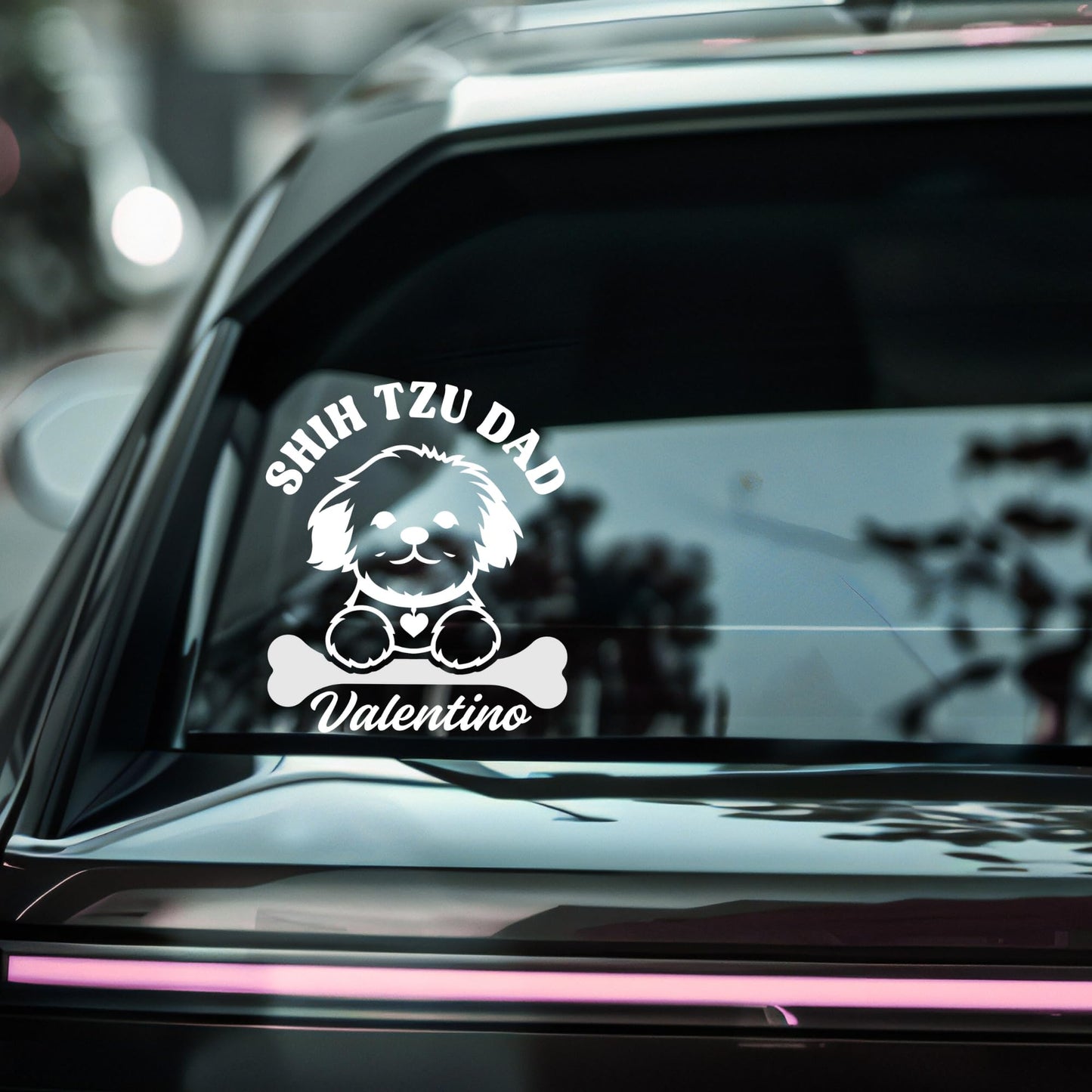 Customizable Shih Tzu Mom or Dad vinyl car decal with pet name, available in multiple colors, shown on a vehicle window.