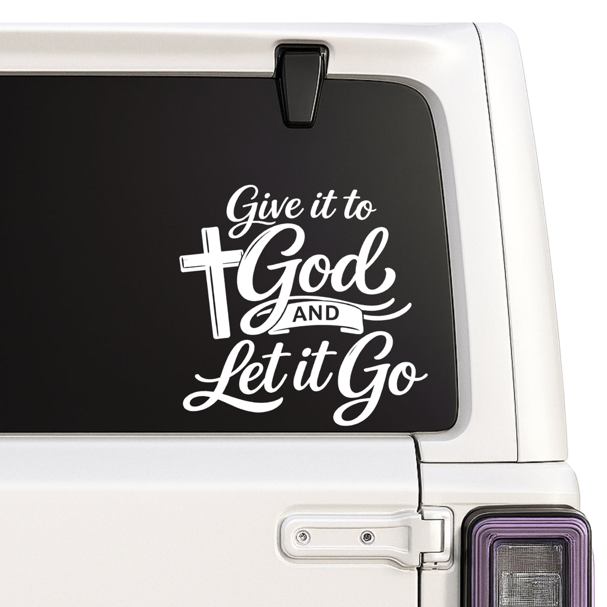 Give It to God and Let It Go — cross design shown on a white Jeep window