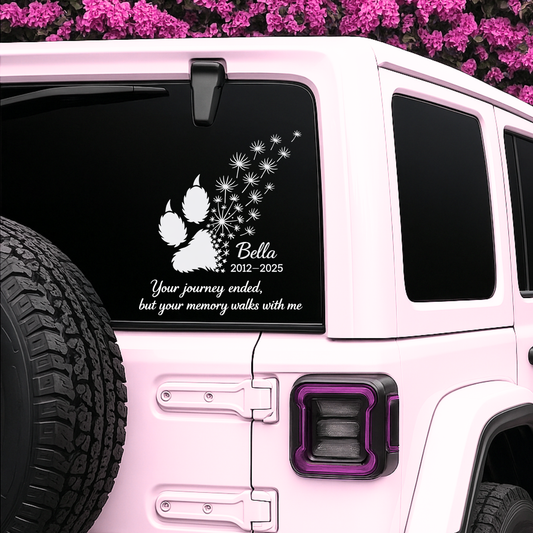 Personalized pet memorial car decal featuring a white dog and cat paw print with custom name and years in vinyl sticker.