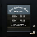 Custom business hours vinyl decal from Nostalgi Factory showing personalized store hours, phone, and website on a transparent background.