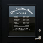 Custom business hours vinyl decal from Nostalgi Factory showing personalized store hours, phone, and website on a transparent background.