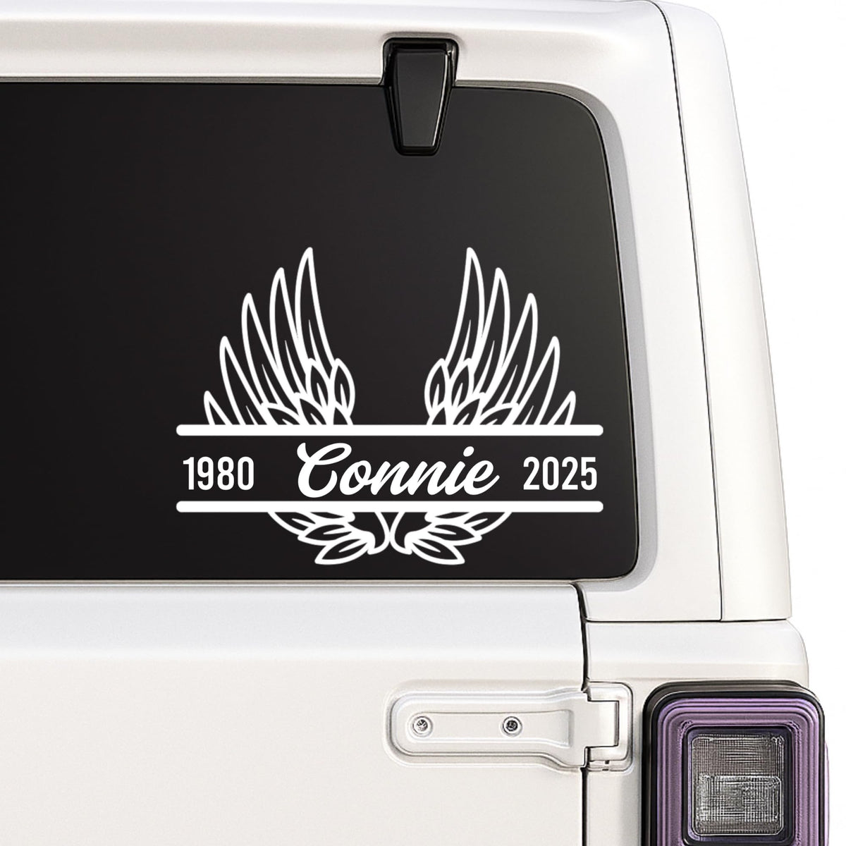 Black 6-inch Angel Wing Memorial Decal by Nostalgi Factory, personalized for memory boxes, cars, mirrors, vases, and more.