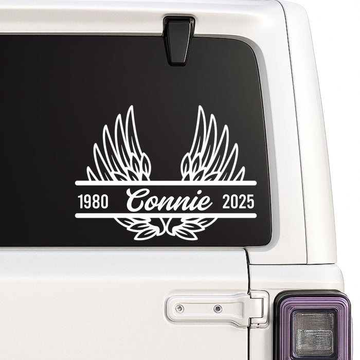 Black 6-inch Angel Wing Memorial Decal by Nostalgi Factory, personalized for memory boxes, cars, mirrors, vases, and more.