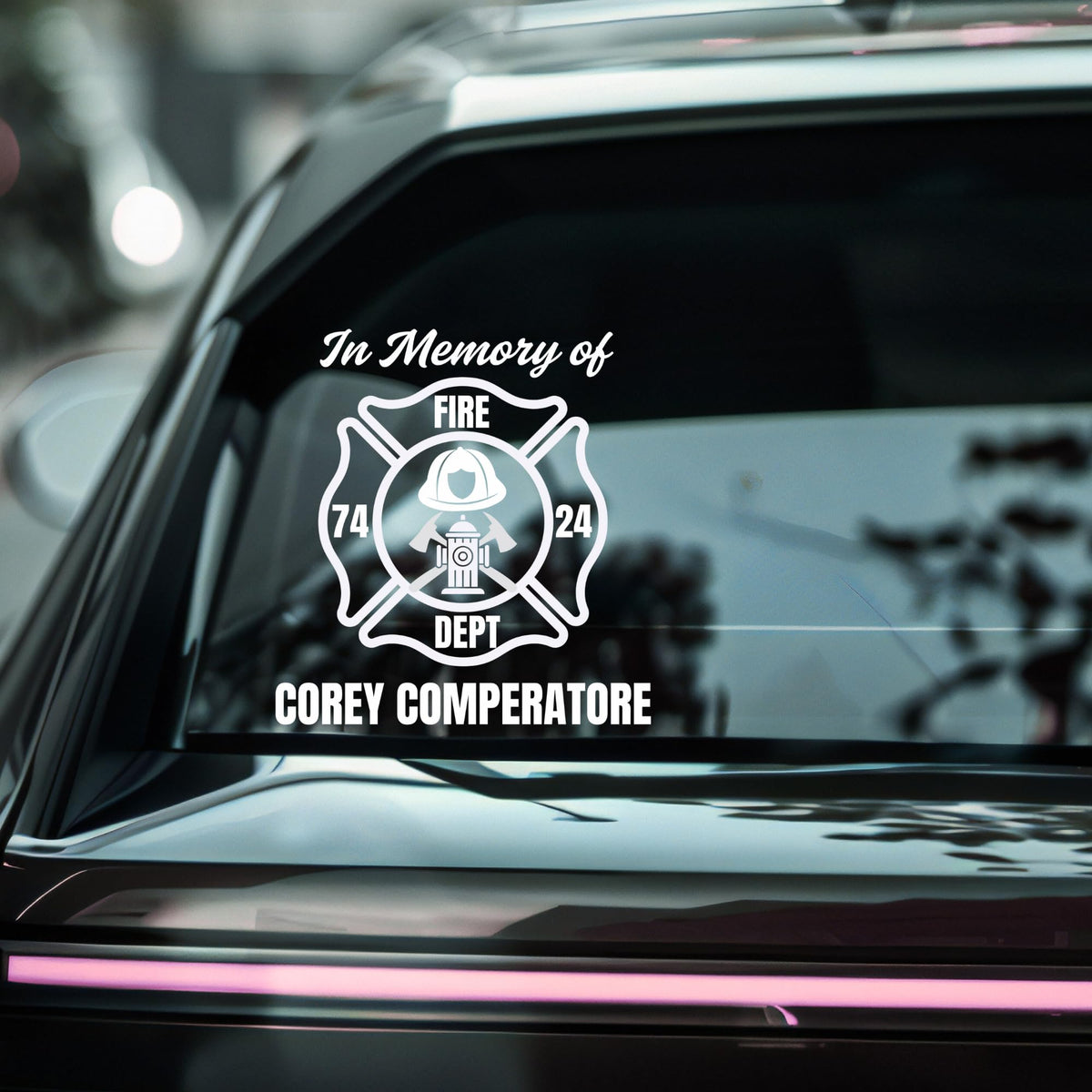 Firefighter memorial decal with custom name and badge, honoring fallen firefighters, from Nostalgi Factory.