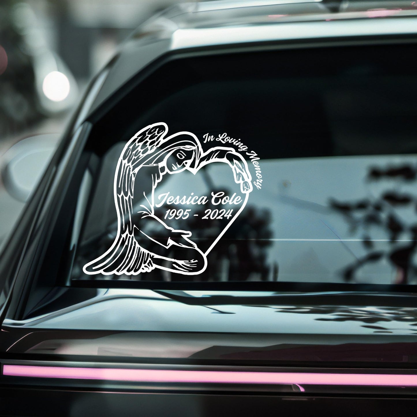 Custom memorial angel vinyl car decal in five color options, featuring in-memory design by Nostalgi Factory.