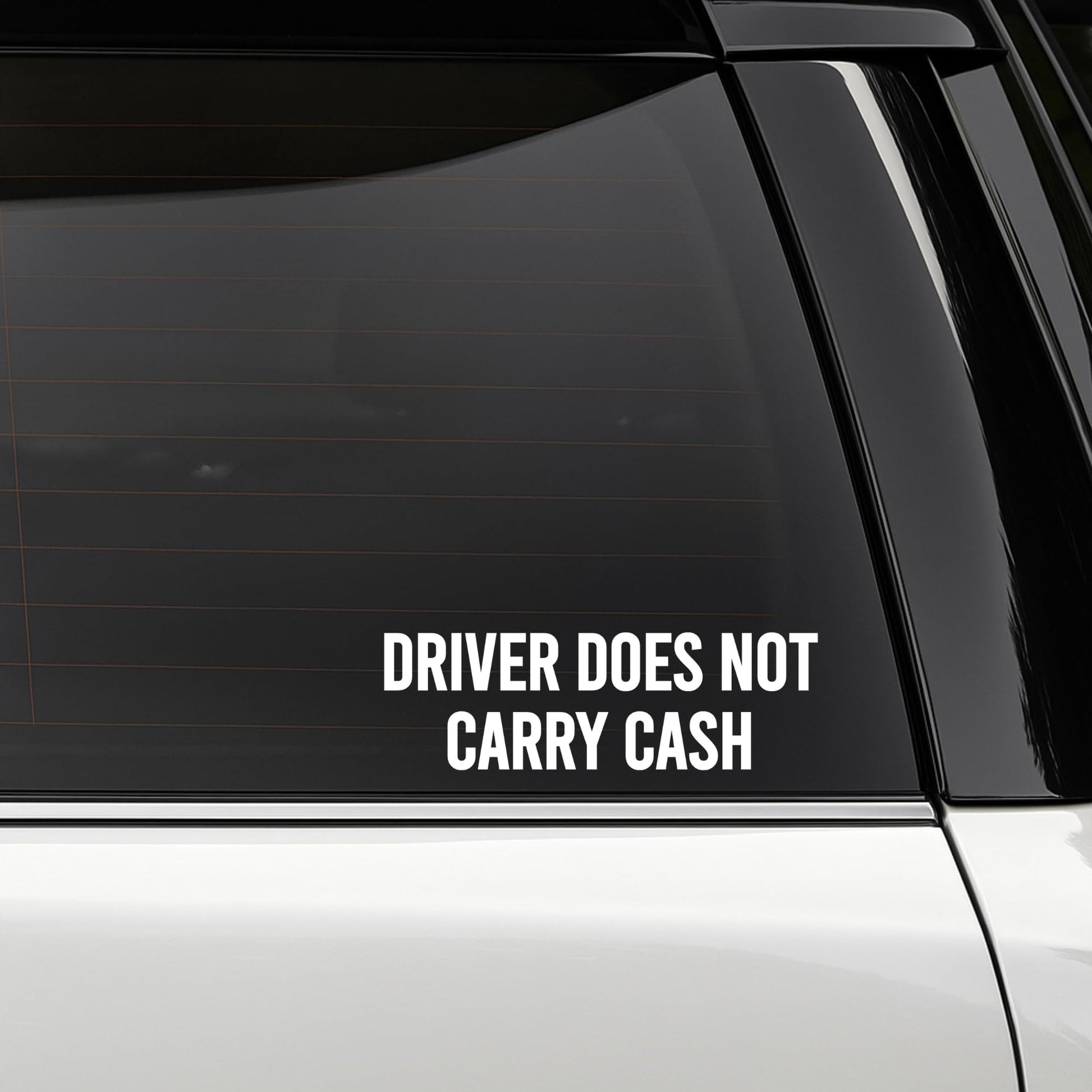 Nostalgi Factory safety vinyl decal reading "Driver Does Not Carry Cash," 4x10 inches, designed for vehicle safety signage.