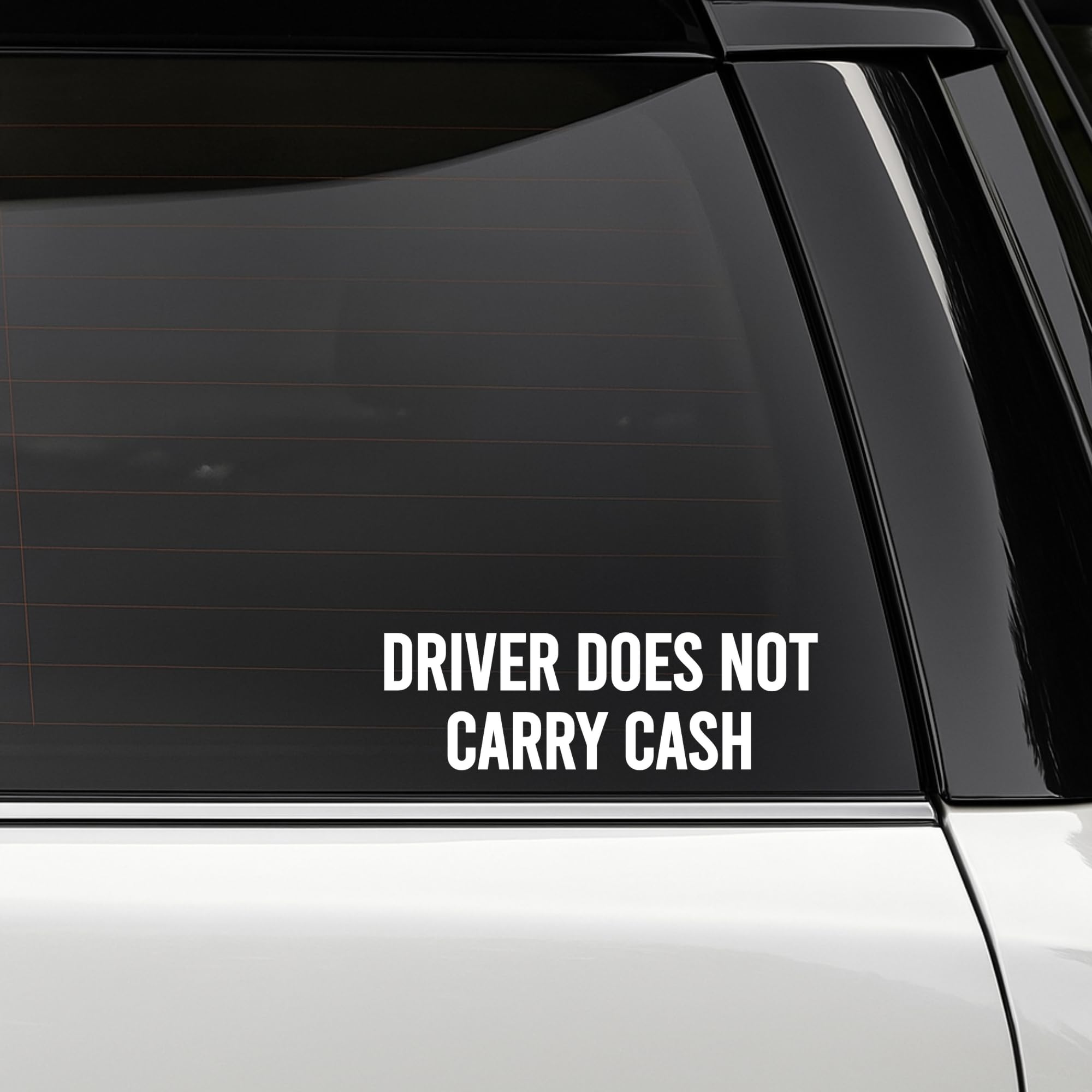 Nostalgi Factory safety vinyl decal reading "Driver Does Not Carry Cash," 4x10 inches, designed for vehicle safety signage.