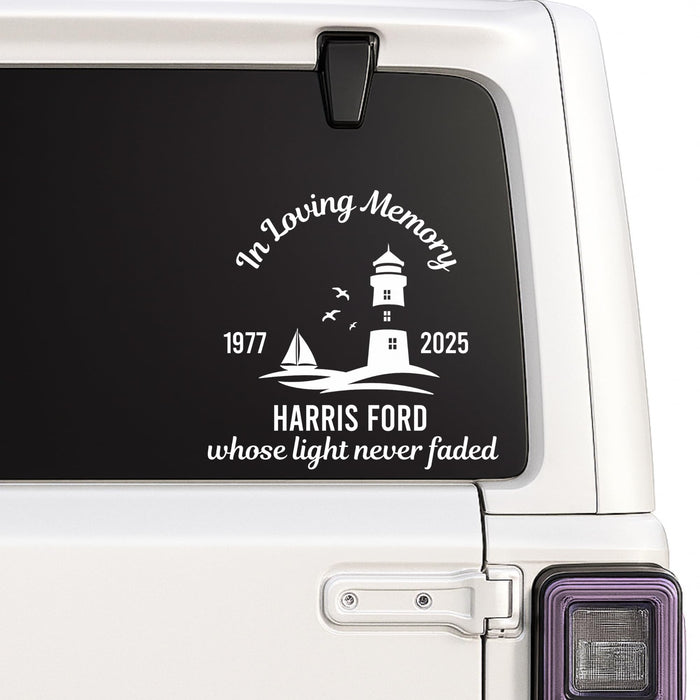 Black lighthouse memorial vinyl decal from Nostalgi Factory, 8-inch size, customizable with name and dates, available in 10 colors.