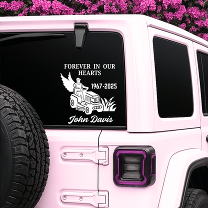 Blue 6-inch vinyl lawn mower memorial decal with angel wings and "Forever In Our Hearts," customizable with name and dates.