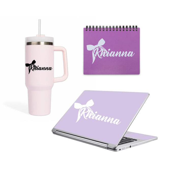 Colorful vinyl decal with a bow design and customizable name, suitable for tumblers, laptops, and notebooks by Nostalgi Factory.