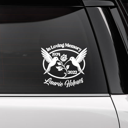 Orange 6-inch hummingbird memorial vinyl decal with custom name and dates, available in 10 colors, for cars or memorial displays.