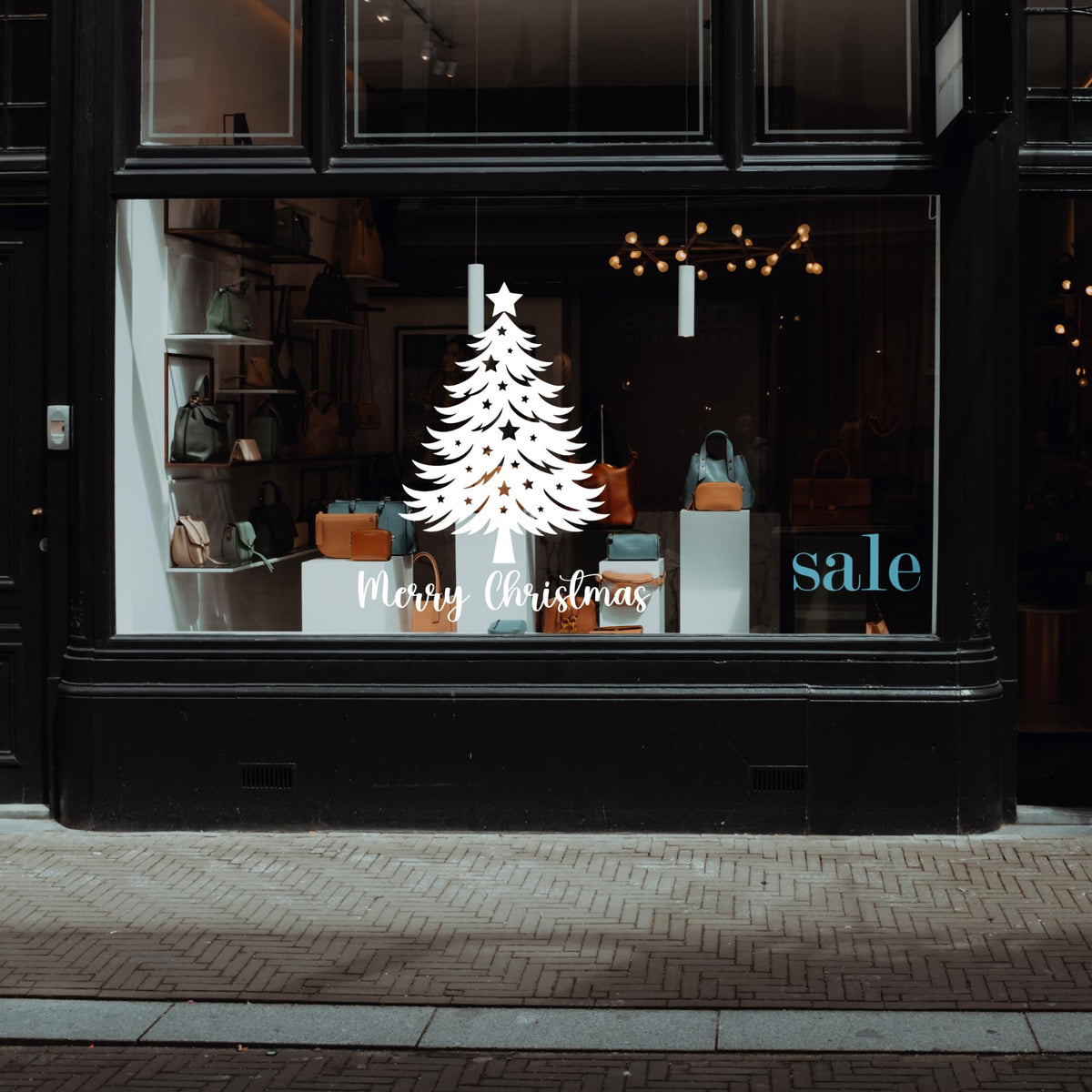 Christmas tree vinyl wall decal with stars and Merry Christmas window sticker by Nostalgi Factory, perfect for festive holiday decor.