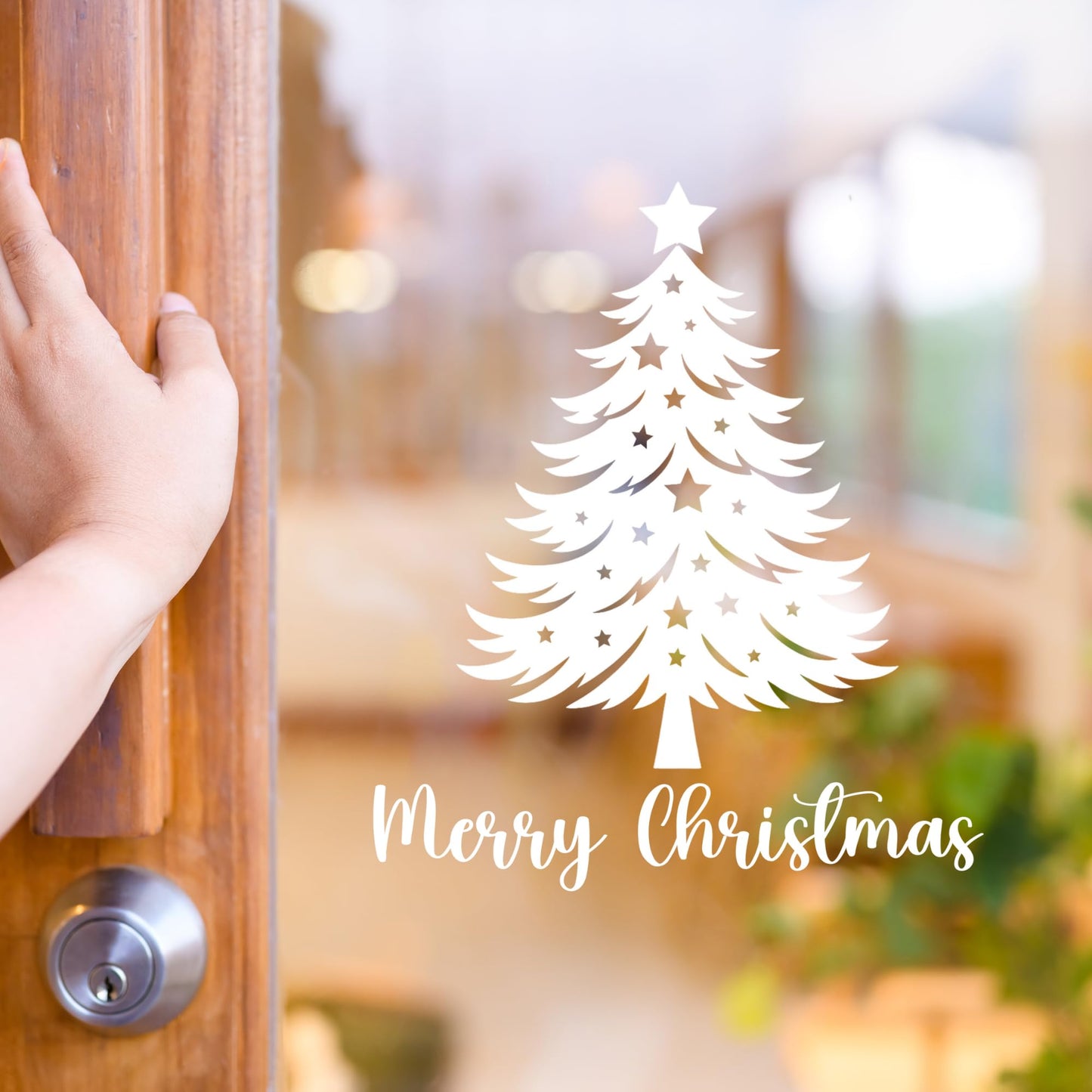 Christmas tree vinyl wall decal with stars from Nostalgi Factory, festive Merry Christmas window sticker for holiday decor.