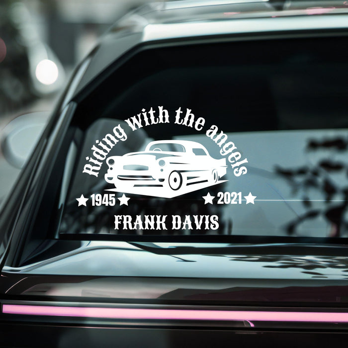Custom classic car memorial decal by Nostalgi Factory featuring "Riding with the Angels" design on vinyl sticker with color options.