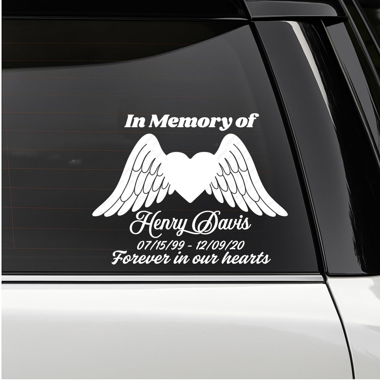 Custom memorial vinyl decal featuring a heart with angel wings, in memory of loved ones, by Nostalgi Factory.