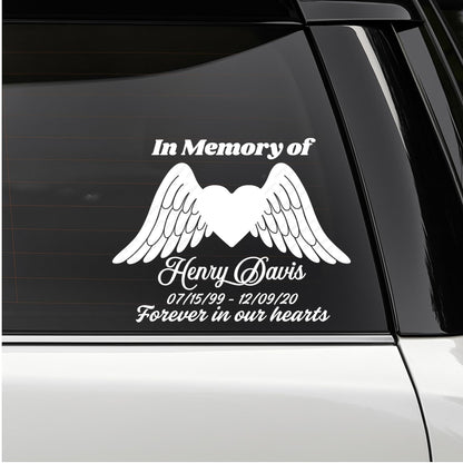 Custom memorial vinyl decal featuring a heart with angel wings, in memory of loved ones, by Nostalgi Factory.