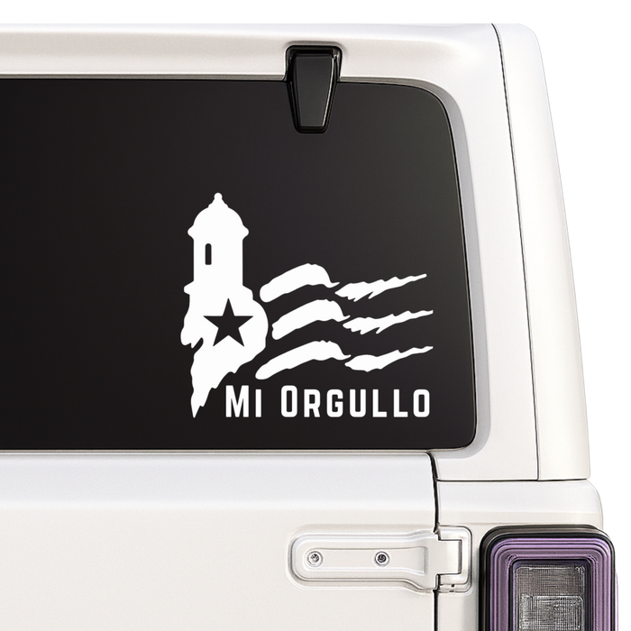 Car window with a decal of a flag design and 'Mi Orgullo' text on a white vehicle.