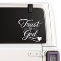 Trust in God — decorative lettering and heart design shown on a white Jeep window