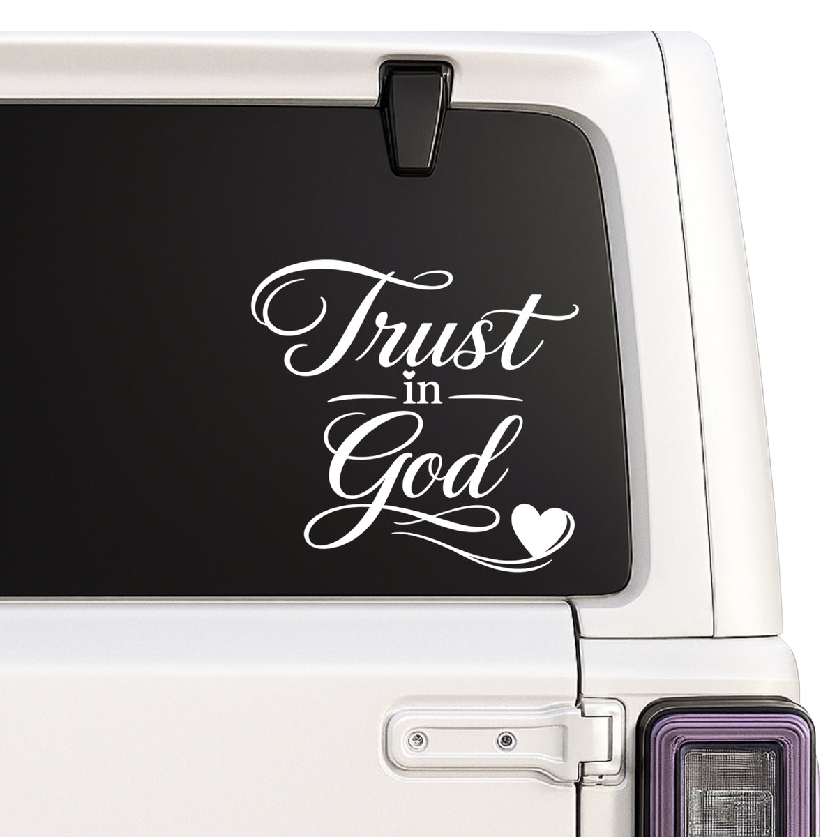 Trust in God — decorative lettering and heart design shown on a white Jeep window